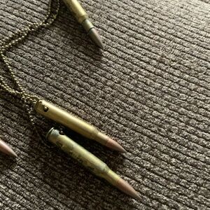 Chain with necklace and bullet engraved with MAGA
